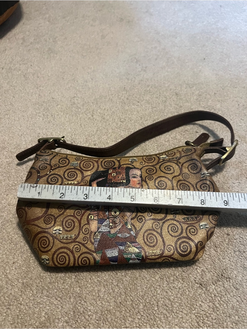 Gold Patterned Mini Wristlet Bag with Artistic Motif